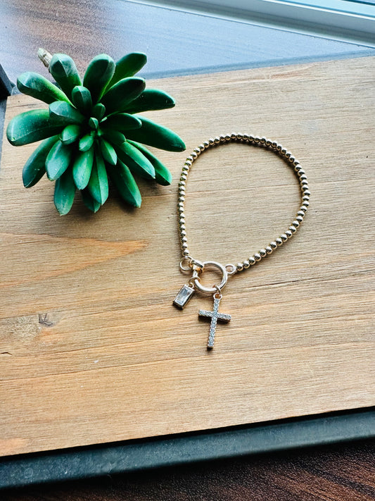 Gold cross bracelet