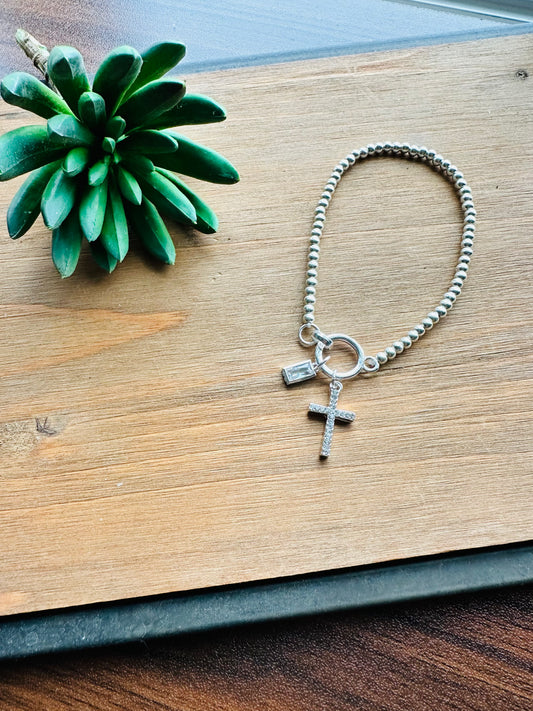 silver cross bracelet
